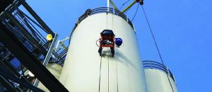 Technician performing proactive silo maintenance