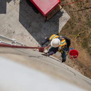 Technician performing silo inspection services.